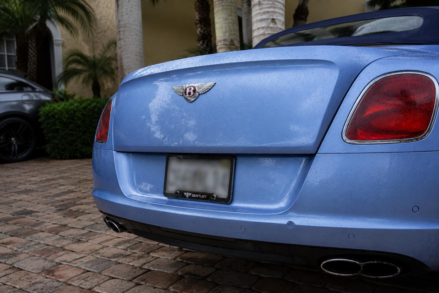 Bentley convertible in a South Florida driveway