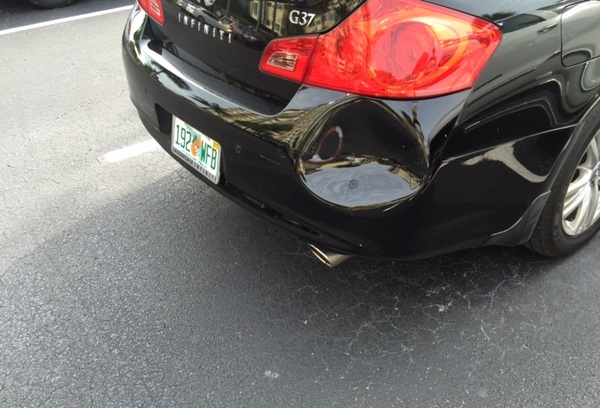 Rear bumper damage before repair